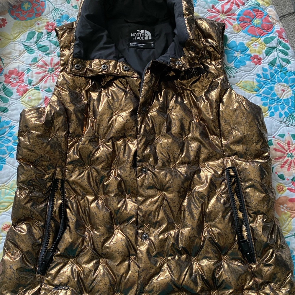 The North Face Women’s down vest size Medium